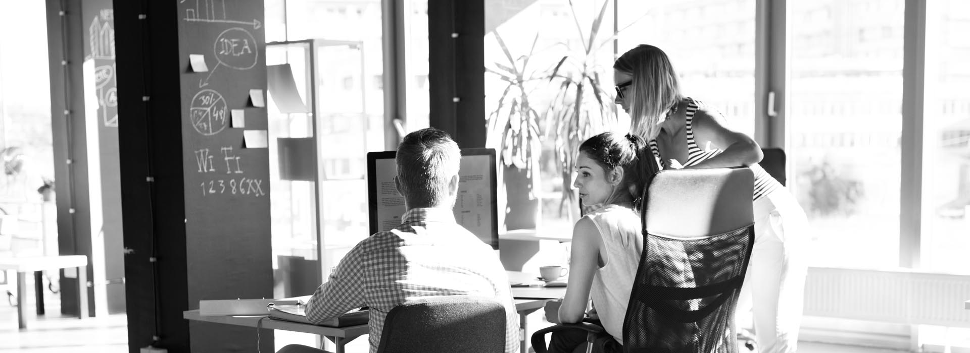 Header - Business Insurance People Working on Computers